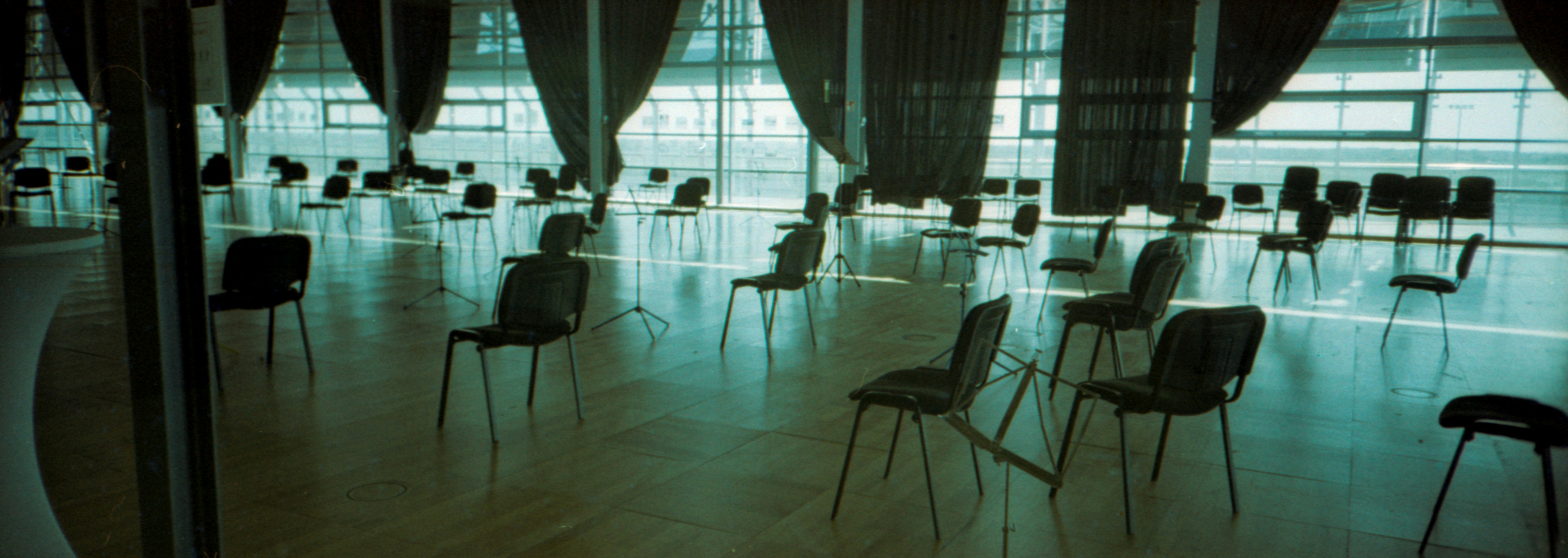 black chairs and table near window